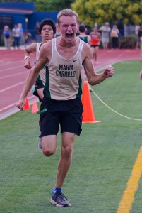 Athlete prepares for pole vault on a track with others watching.