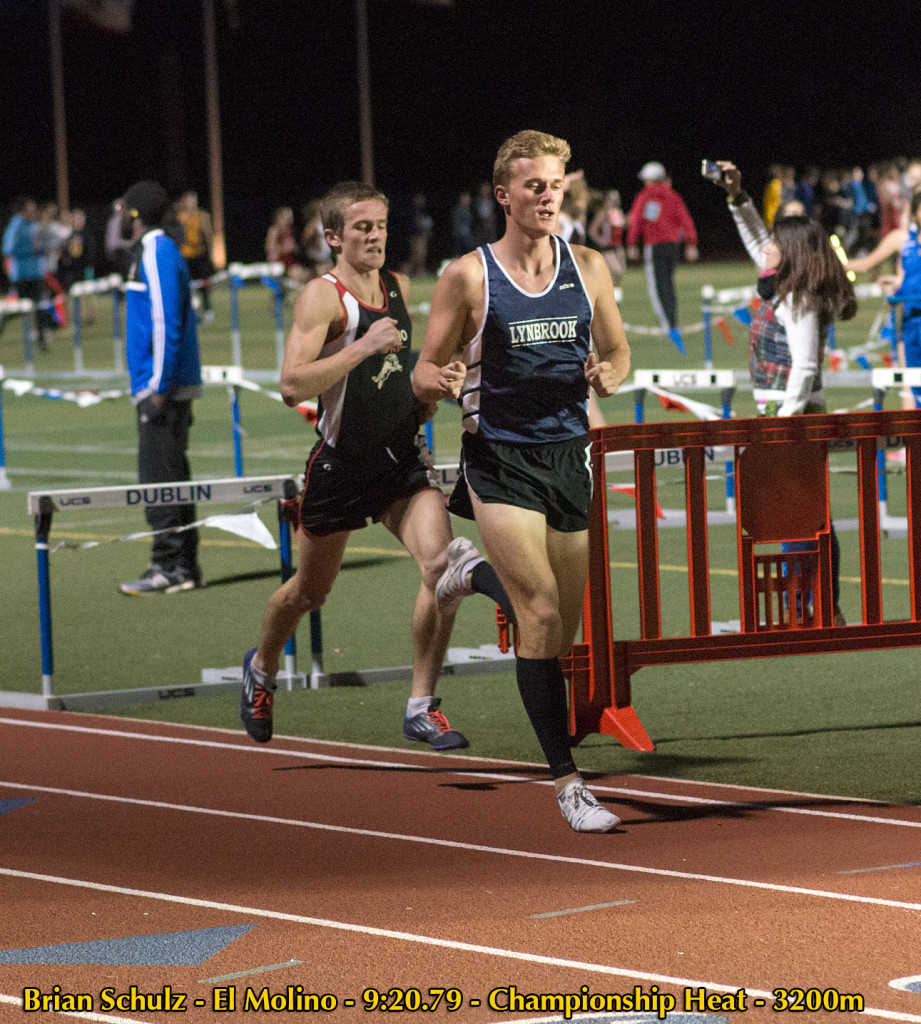 Athlete prepares for pole vault on a track with others watching.