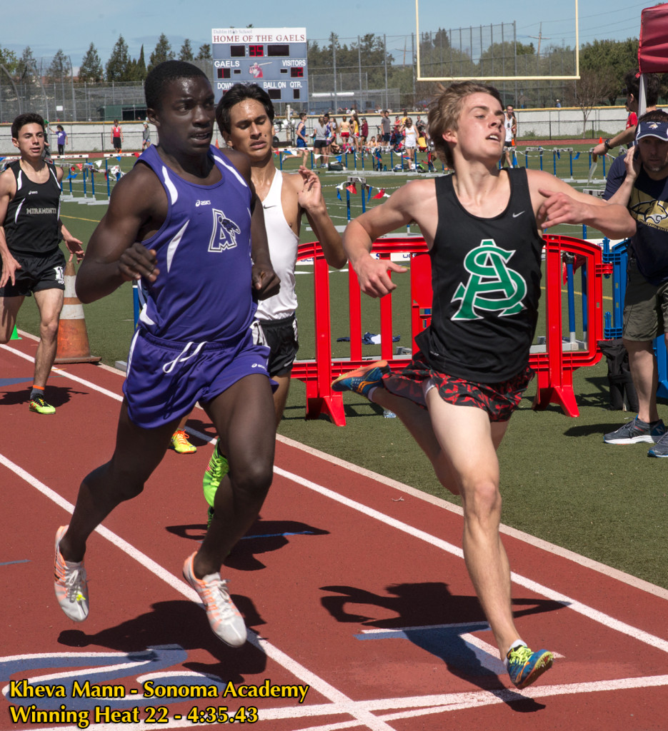 Athlete prepares for pole vault on a track with others watching.