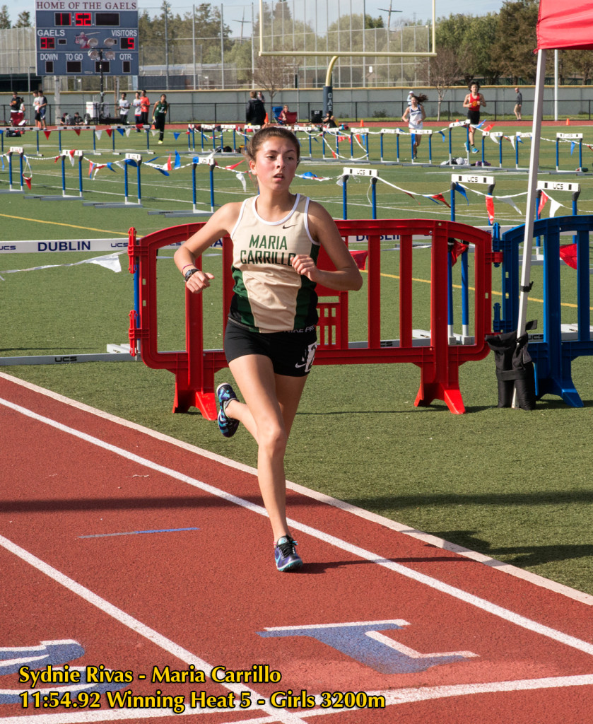 Athlete prepares for pole vault on a track with others watching.