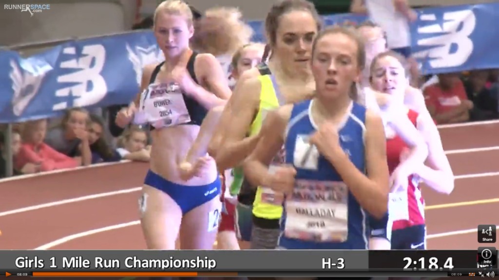 Athlete prepares for pole vault on a track with others watching.
