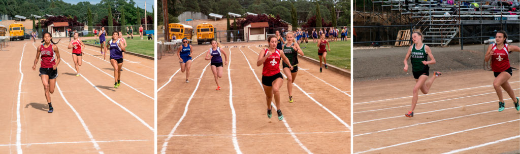 Athlete prepares for pole vault on a track with others watching.